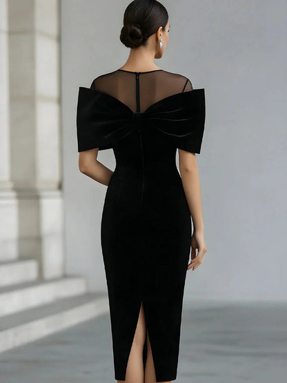 Women's Black Velvet Midi Dress with Sheer Boat Neck and Statement Bow