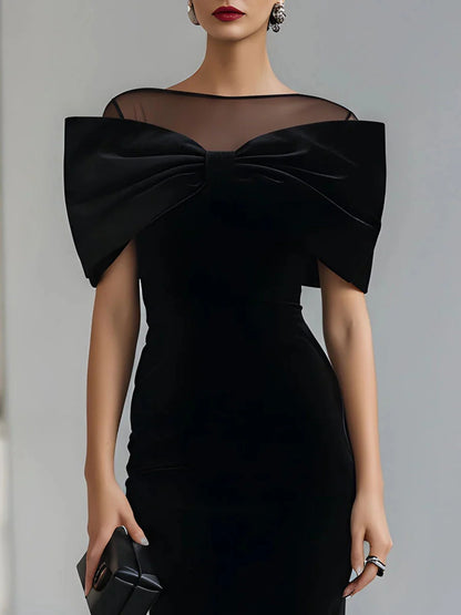 Women's Black Velvet Midi Dress with Sheer Boat Neck and Statement Bow