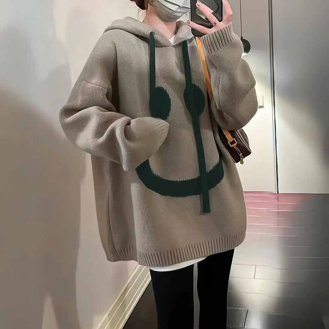 Women’s Oversized Smiley Graphic Hooded Knit Pullover with Kangaroo Pocket