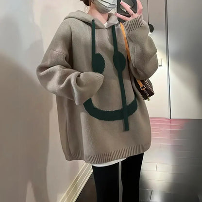Women’s Oversized Smiley Graphic Hooded Knit Pullover with Kangaroo Pocket