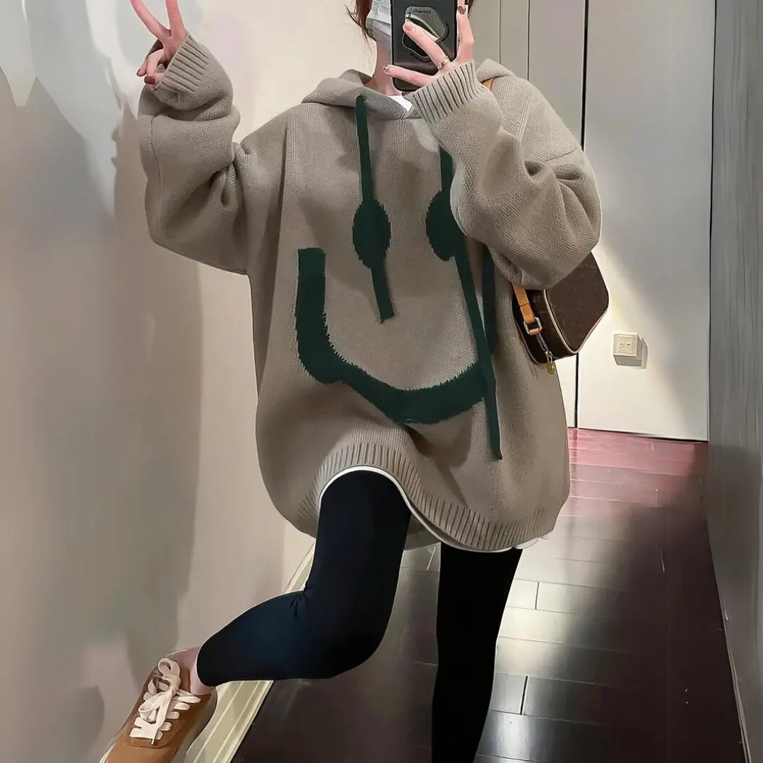 Women’s Oversized Smiley Graphic Hooded Knit Pullover with Kangaroo Pocket